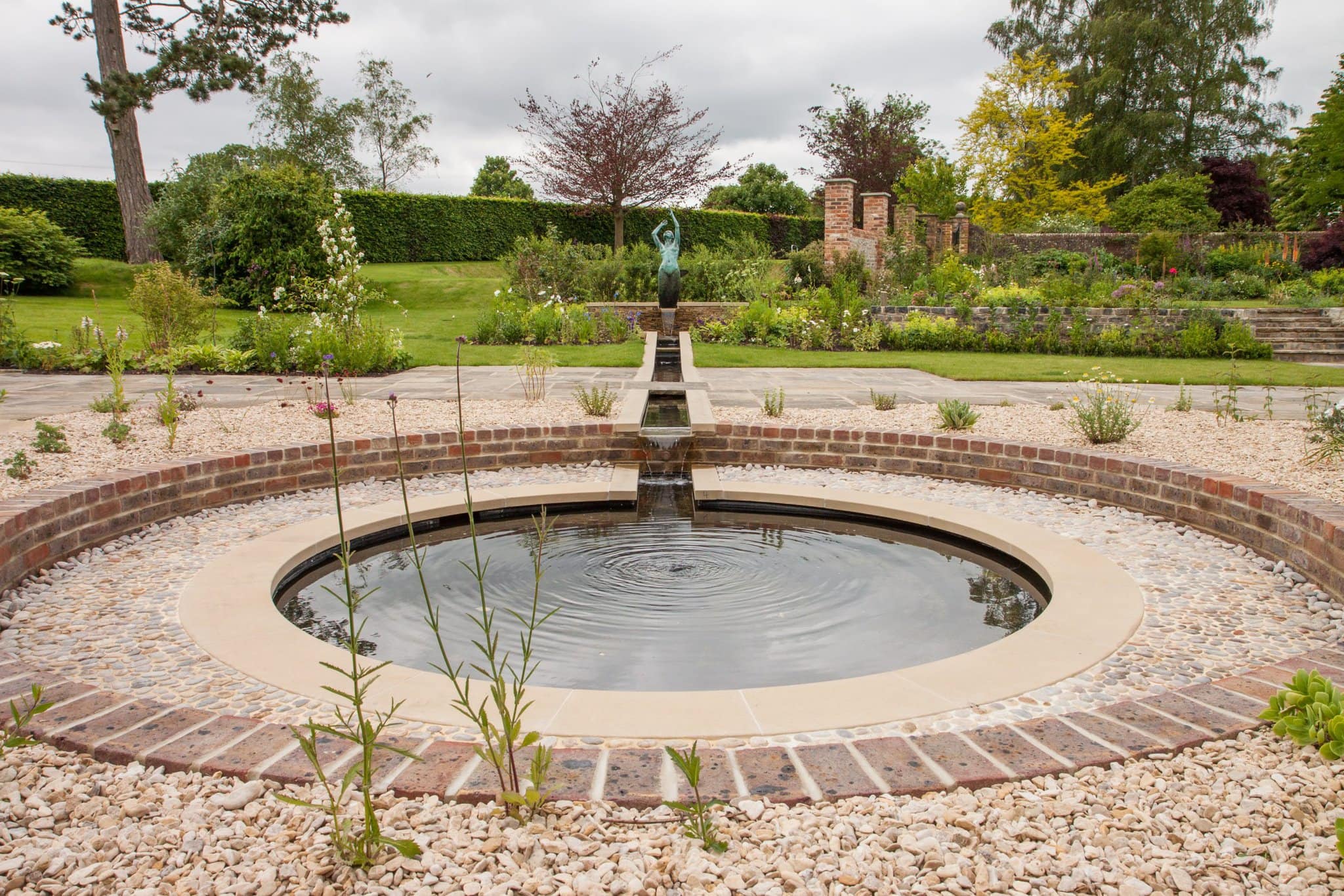 Water feature with statue