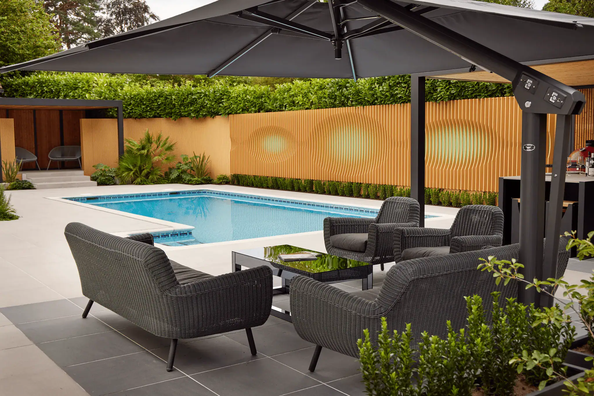 eating and entertaining areas help define how the pool garden is used throughout the day.